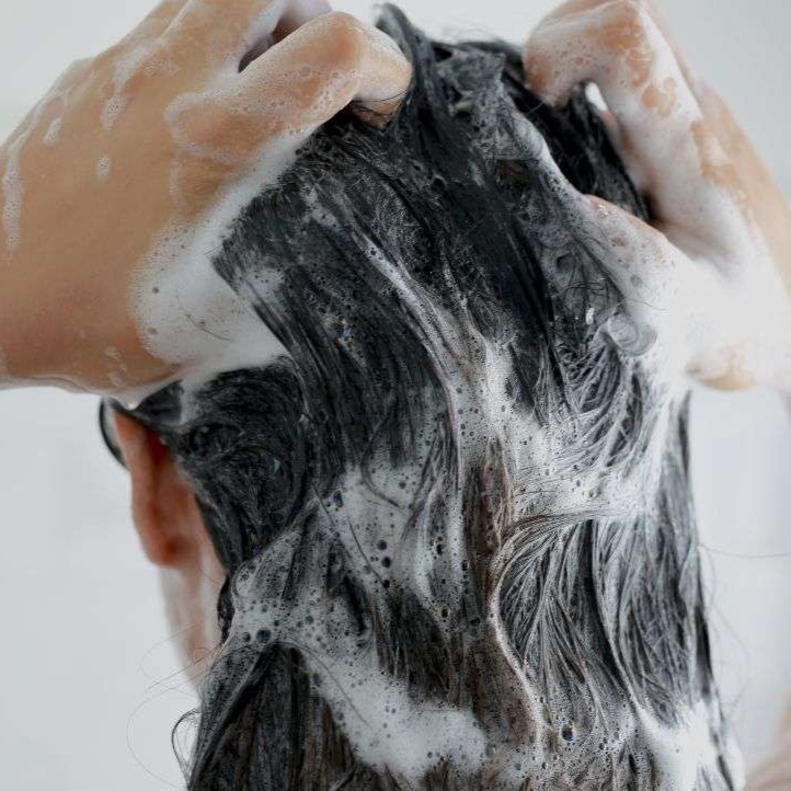 woman washing her hair