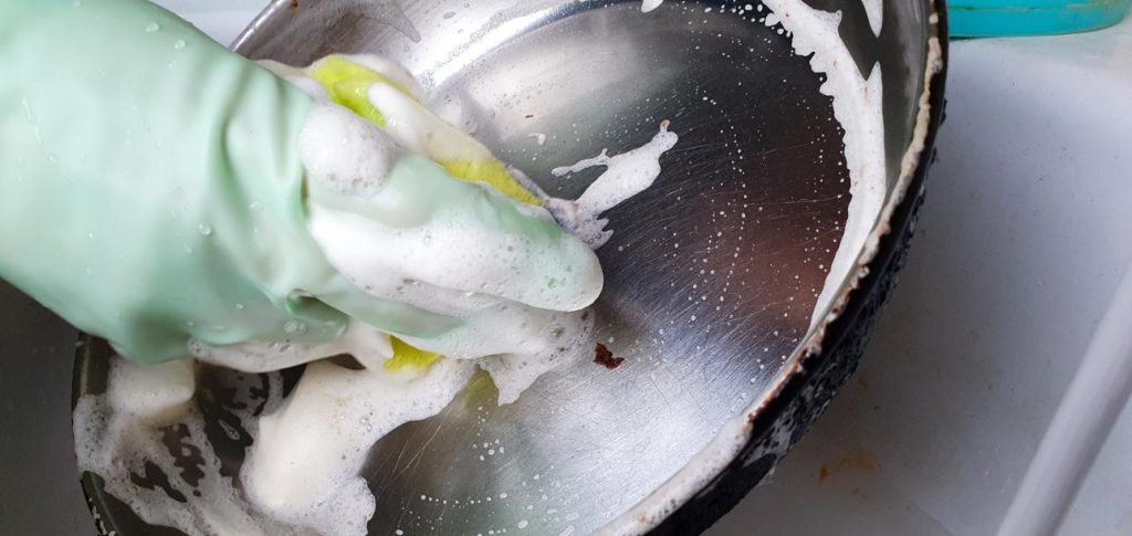 washing greasy dishes